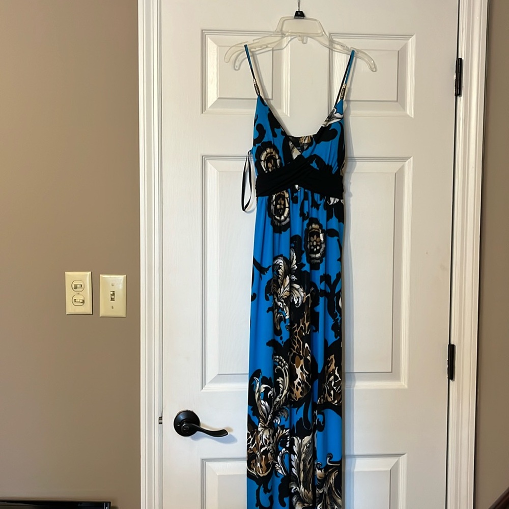 Ladies floral maxi dress with beaded accents.